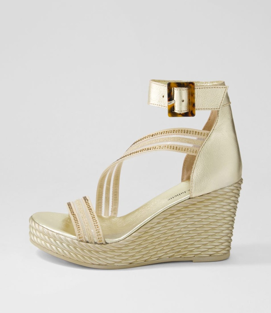 DJANGO & JULIETTE Estela Gold Vinylite Leather Sandals | Wedges